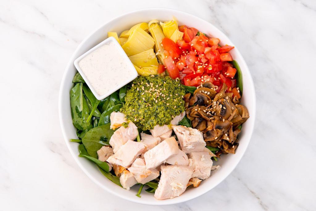 Pesto Ranch Salad · Spinach, artichokes, tomatoes, sauteed mushrooms, pesto, sesame seeds, vegan ranch dressing. Served with your choice of roasted antibiotic-free chicken or roasted sesame tofu. (gluten-free)
