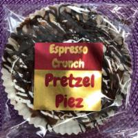 Espresso Crunch Pretzel Piez · Mound of pretzel nubs and twists, covered in milk chocolate, topped with white chocolate, es...