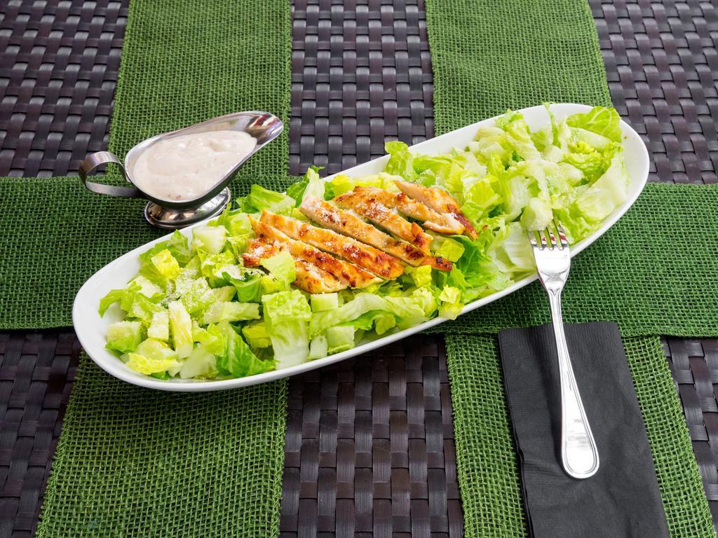 Caesar Salad · Romaine lettuce, croutons, Parmesan cheese with authentic Caesar dressing.