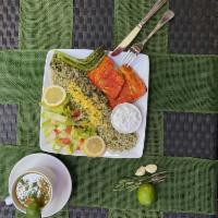 Grilled Salmon · Served with rice or vegetables, french fries and pita.