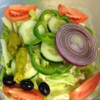 Garden Salad · Iceberg lettuce, cucumber, tomatoes, green peppers and onions.