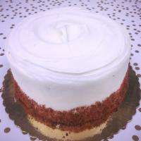 Red Velvet Torte · Light chocolate cake colored red, filled and frosted with cream
cheese and garnished with re...