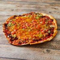 Taco Pizza · Seasoned ground beef, lettuce, tomatoes, cheddar, and mozzarella cheese.