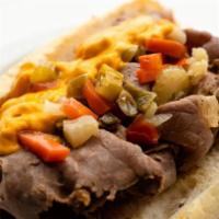 Superior Italian Beef · Classic Tender Beef Slices on Italian Bread dipped in beef Juice  topped with Cheddar and Ho...