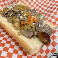 Italian Sausage and Beef Combo Sandwich · Best Of Both Worlds, Spicy Italian ?Sausage Link Smothered In Italian Beef On a 9'In Loaf On...