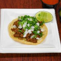 Tacos · Fresh handmade corn tortilla with your choice of meat and fresh chopped cilantro and onion.