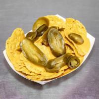Nachos  · Comes with Nacho Cheese and jalapenos
