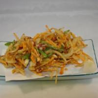 Kakiage Tempura · Deep fried mixed vegetable and seafood with tempura sauce.