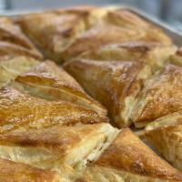 Khachapuri · Light and baked savory pastries stuffed with cheese or ground beef