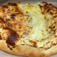 Megruli Khachapuri · 6 oz dough stuffed with feta/mozzarella cheese, topped with more cheese and coated with egg ...