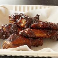 6 PC Grilled Wings · Served with choice of sauce.