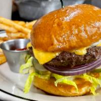 Pub Burger · american cheese, duke’s mayo, shredded lettuce, fresh tomato, red onion, housemade pickles