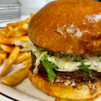 Bourbon Street Burger · cast iron blackened with cajun spices, housemade buttermilk parmesan, herbed cream cheese, b...