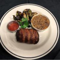 Bacon Wrapped Meatloaf · slow roasted with honey chipotle ketchup, sweet potato casserole and bacon brussels sprouts