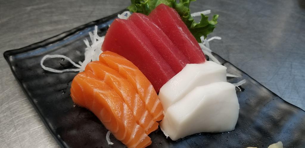 Sashimi Sampler  · 3 pieces salmon, 3 pieces tuna, 2 pieces white tuna.