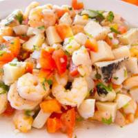 Mixto Ceviche · Corvina fish, calamari, shrimp, octopus, lime, spices, choclo, camote and canchita