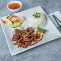C1-Grilled Pork Special · Com bi thit nuong đac biet. White rice served with grilled pork, Shredded pork skin, fried e...