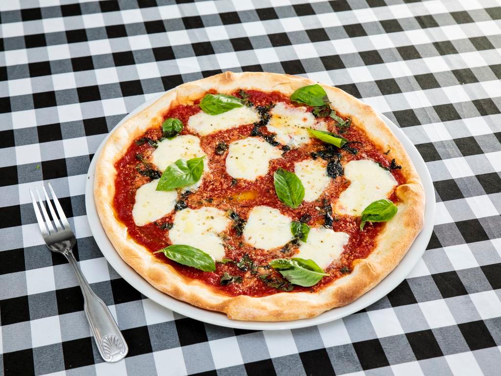 Regina Margherita Pizza · Pizza sauce, fresh mozzarella, basil and olive oil.