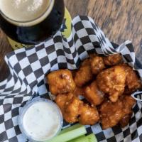 Boneless Buffalo Wings · Choice of house BBQ or house Buffalo. Served with celery and ranch.