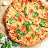 Margherita Pizza · Pizza sauce, tomato, Parmesan, mozzarella, basil, and garlic.