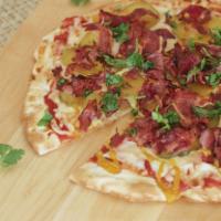 Pastrami Pizza · Pizza sauce, mozzarella, mustard, pickles, and pastrami.