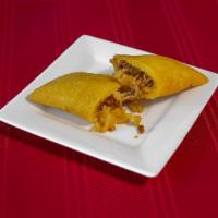 Ground Pork Empanada (6 pack) · These typical Colombian-style empanadas are tasty turnovers made with savory yellow corn dou...