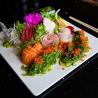 Sashimi Dinner · Serves with wide array of our finest sashimi for 2. Served with soup and salad.