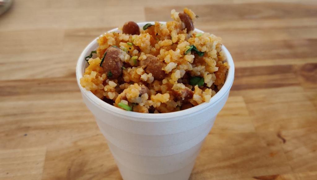 Rice with Beans · Seasoned rice with local beans and seasonal touches. Always prepared gluten-free, dairy-free, and vegan.