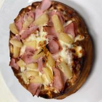 Hawaiian Pizza Waffle · Tangy tomato sauce, mozzarella cheese, ham and pineapple.
