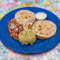 QUESADILLAS POBLANAS · Two Quesadillas served with your choice of meat, grilled poblanos and a blend of queso Oaxac...