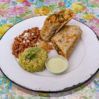 DON CAMARON GRILLED BURRITO · Grilled garlic shrimp with cilantro rice, grilled poblanos, red onions, melted queso, cilant...