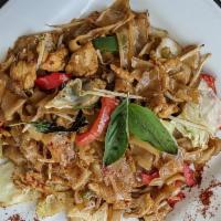 Drunken Noodles · Stir-fired wide rice noodles with bean sprouts, cabbage, bell pepper, onion and sweet basil ...