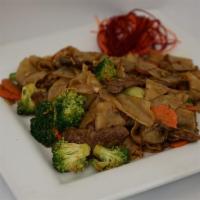 Pad See Ewe · Stir-fried wide rice noodles with egg, broccoli, and carrot in Thai sweet soy sauce. Vegetar...