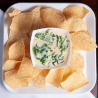 Spinach Dip · 16 oz. Freshly chopped spinach with our house blended of cheese dip.