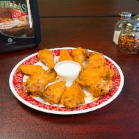 Boneless Chicken Wings · Choice of 1 flavor, ranch or blue cheese dressing.