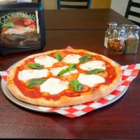 Margherita Pizza · Named after the Queen of Italy pizza sauce, topped with fresh mozzarella, fresh tomatoes, an...