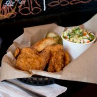Fried Chicken Box · 2 pieces of fried chicken served with buttermilk biscuit and your choice of side.