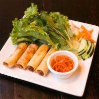 Chicken Egg Roll · Crispy dough filled with minced vegetables.