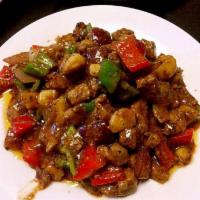 Pepper Steak with Onion · Stir fried steak with vegetables and a savory sauce.