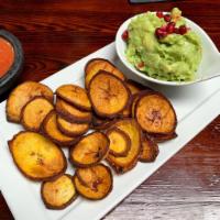 House Guacamole · Fresh avocado, tomato, cilantro, fresh lemon, red onion and plantain chips.