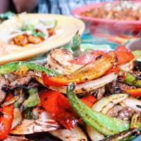 Fajita Combination · Grilled red and green bell peppers, grilled onions, pico de gallo, guacamole, rice and beans...