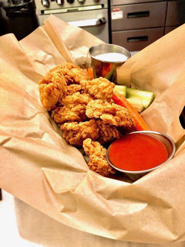 Boneless Wings · White breast meat battered and fried in your choice of sauce. Served with carrots, celery, and house-made ranch.