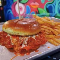Hot Shorty · 3 chicken tenders tossed in buffalo sauce, topped w/house made ranch on a brioche bun.