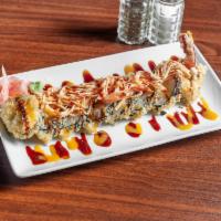 Crunchy Roll  · Shrimp tempura, avocado & cream cheese. Topped with spicy crabmeat, tobiko, spicy mayo & eel...