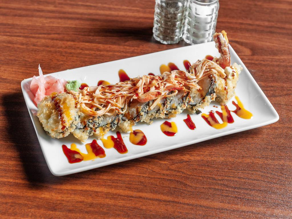 Crunchy Roll  · Shrimp tempura, avocado & cream cheese. Topped with spicy crabmeat, tobiko, spicy mayo & eel sauce.