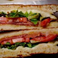 Ham and Cheese Sandwich · Ham and mozzarella cheese dressed with lettuce, tomatoes, mayonnaise and mustard. Made with ...