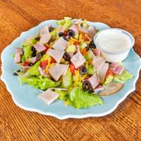 Chef Salad · Ham, turkey, lettuce, tomatoes, black olives and cheddar cheese.