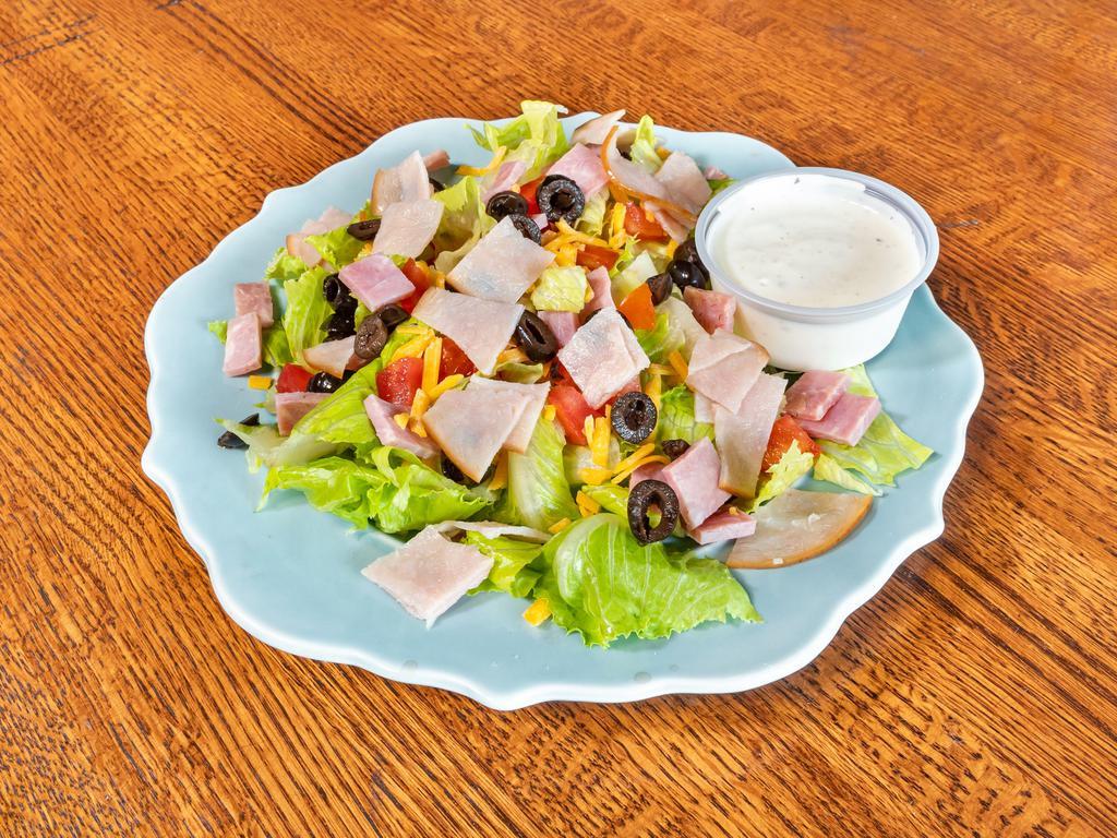 Chef Salad · Ham, turkey, lettuce, tomatoes, black olives and cheddar cheese.