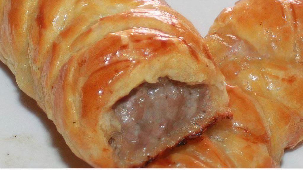 Sausage Roll · Seasoned sausage meat encrusted in a puff pastry.