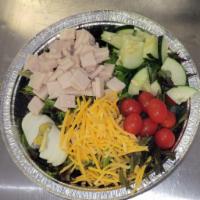 Chef Salad · Lettuce, tomato, cucumber, shredded cheese, egg and crutons. Choice of ham, bacon,or turkey
